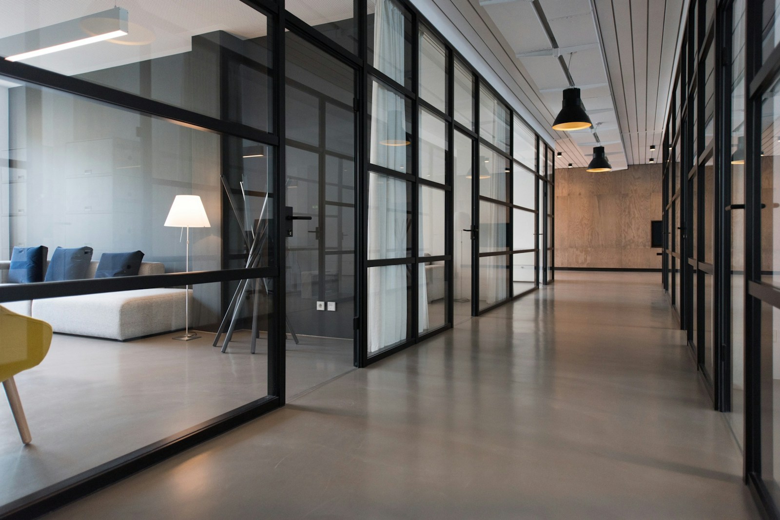 A bright, connected workplace with desks and computers